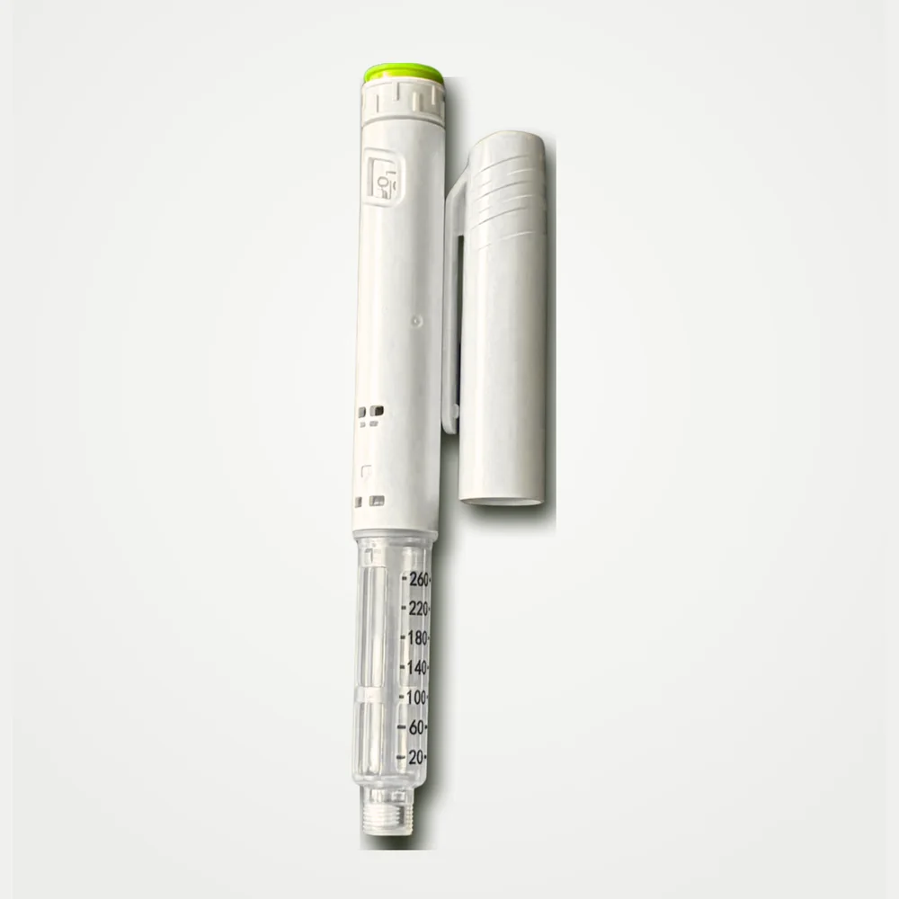 Eva pre-filled pen with its cap beside it